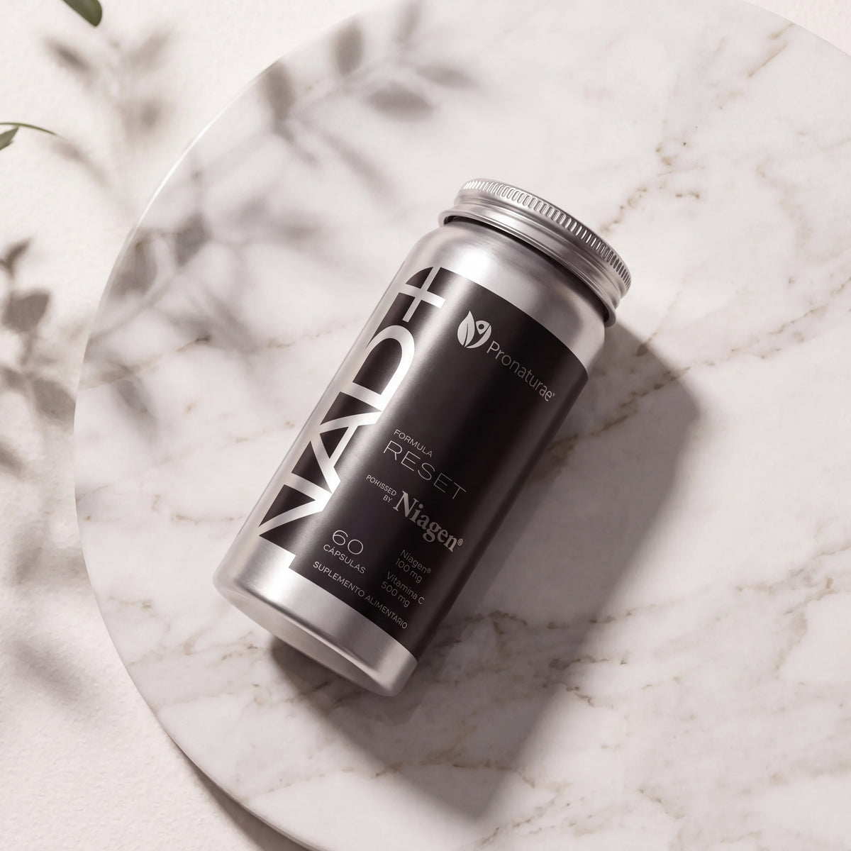 NAD+ Formula RESET sobre marmol